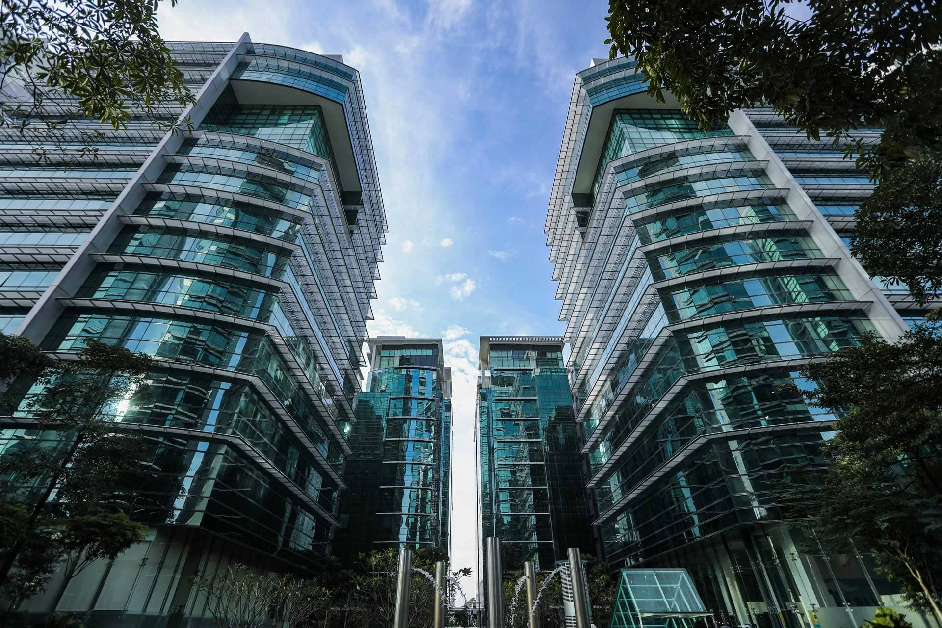Glass-fronted Horizon boutique office towers viewed from the landscaped courtyard in Bangsar South